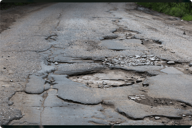 road full of potholes