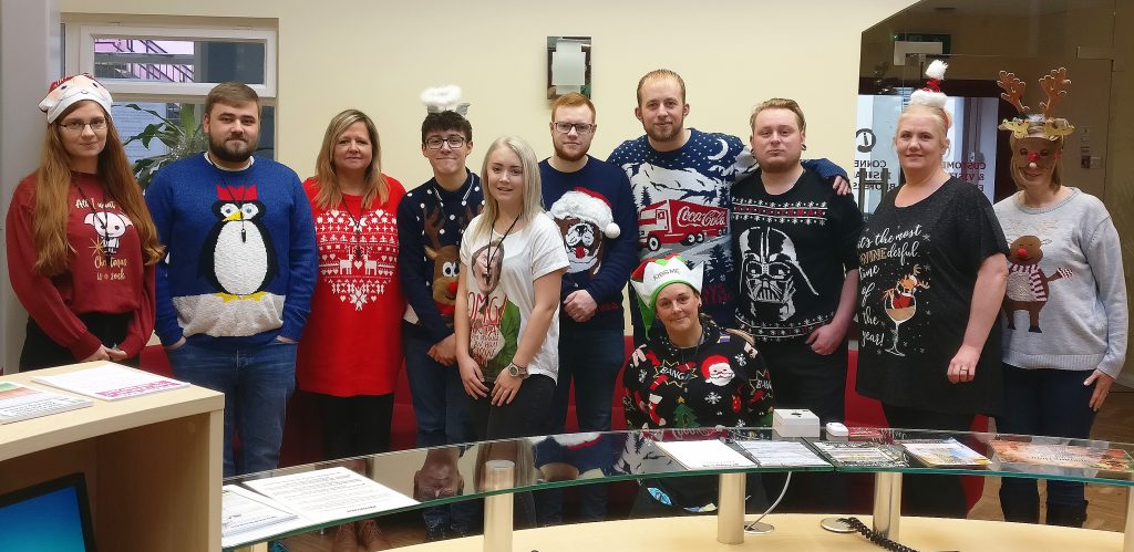 Staff at Connect Insurance wearing their wool Christmas Jumpers for Christmas Jumper Day 2018.